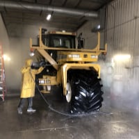 Farm equipment being cleaned